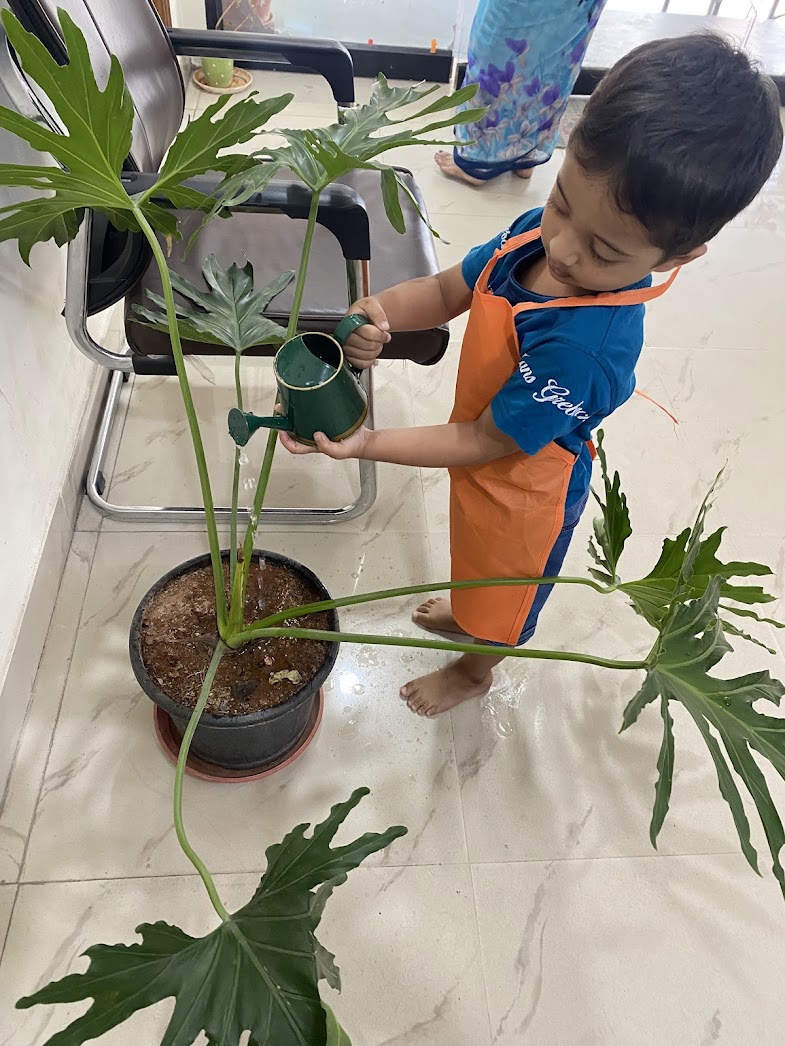 Toddler practicing practical life activities